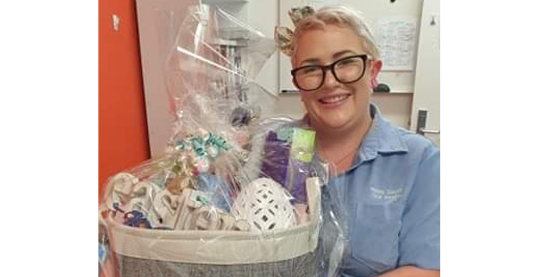 amy brodie holding Easter hamper.